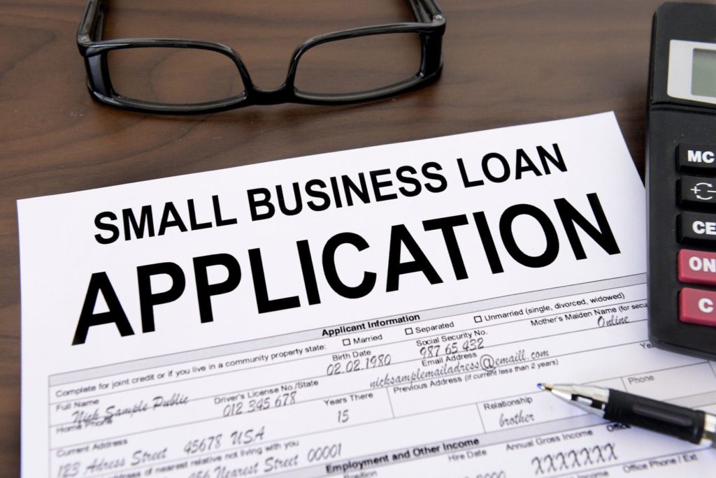 Suggest captivating images or visuals to include in our blog post about how to apply for a small business loan online